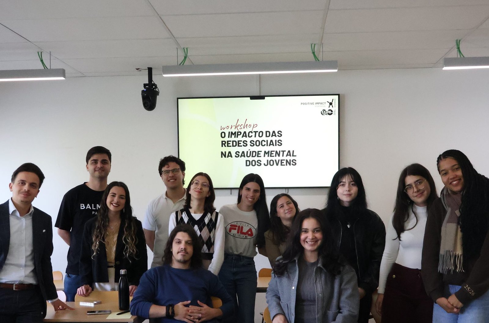 Participants at a Positive Impact Portugal workshop on the impact of social media on young people's mental health